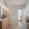 Spa-Like Bathrooms featuring Framed Mirrors with Accent Pendant Lighting