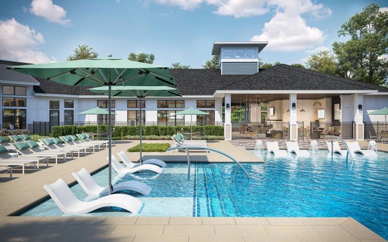 a swimming pool with lounge chairs